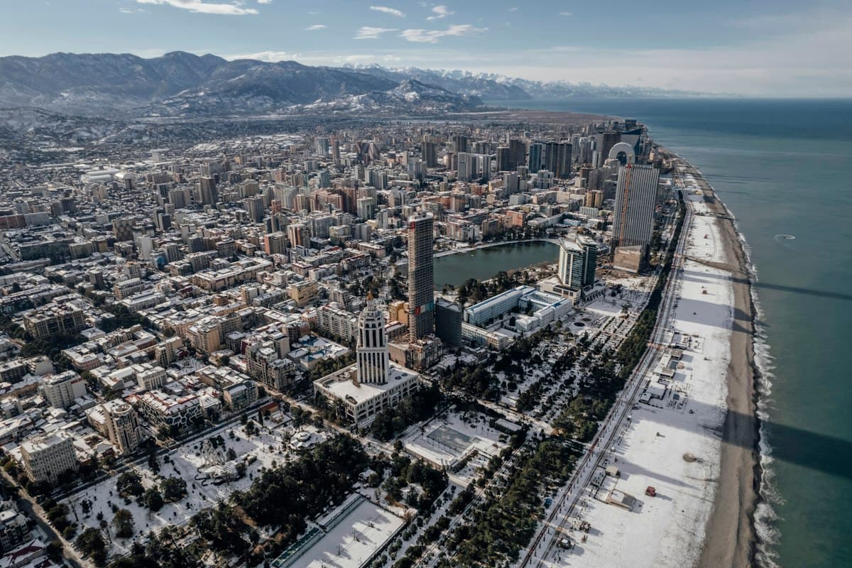 Aerial view of Batumi's Black Sea coastline and skyline in winter